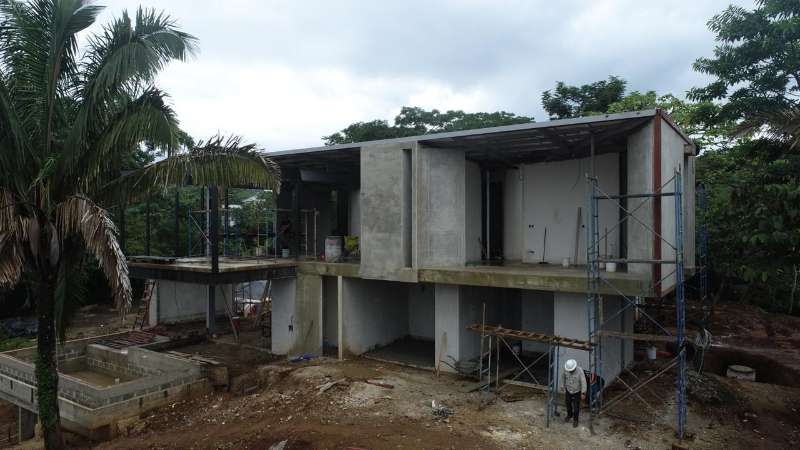 Home under construction at Nosara Estates showing structural progress and building framework in Nosara