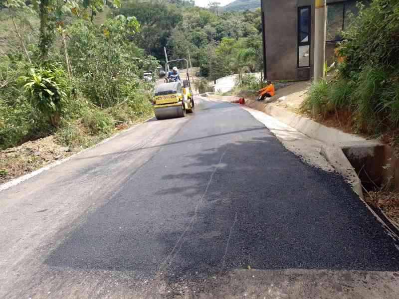 Road paving in progress at Nosara Estates 2.5km community road construction